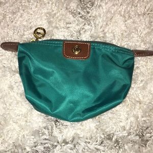 Long Champ teal makeup bag
